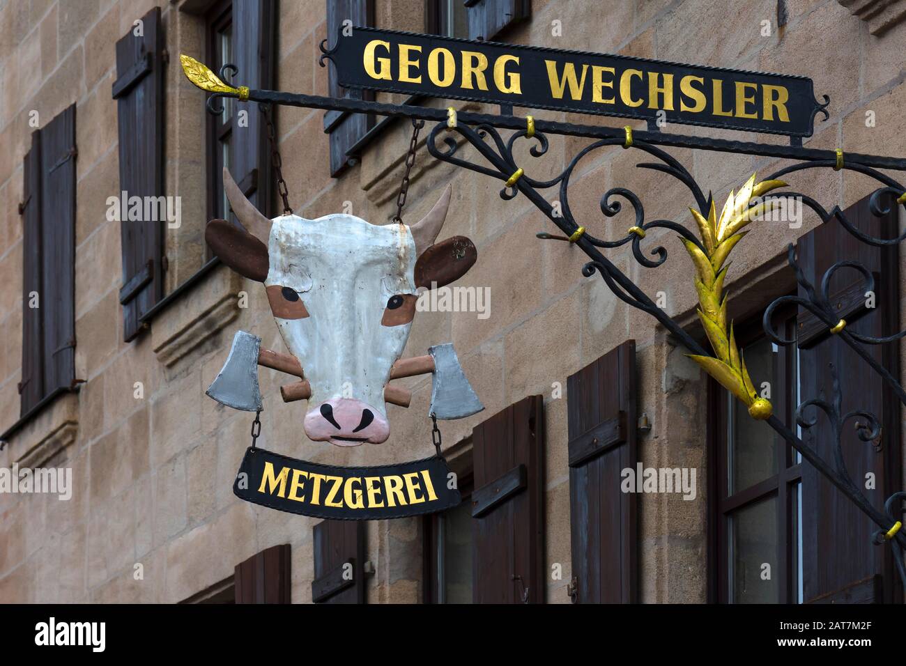 Bouclier de nez avec une tête de vache d'un magasin de boucher, Spalt, moyenne-Franconie, Bavière, Allemagne Banque D'Images