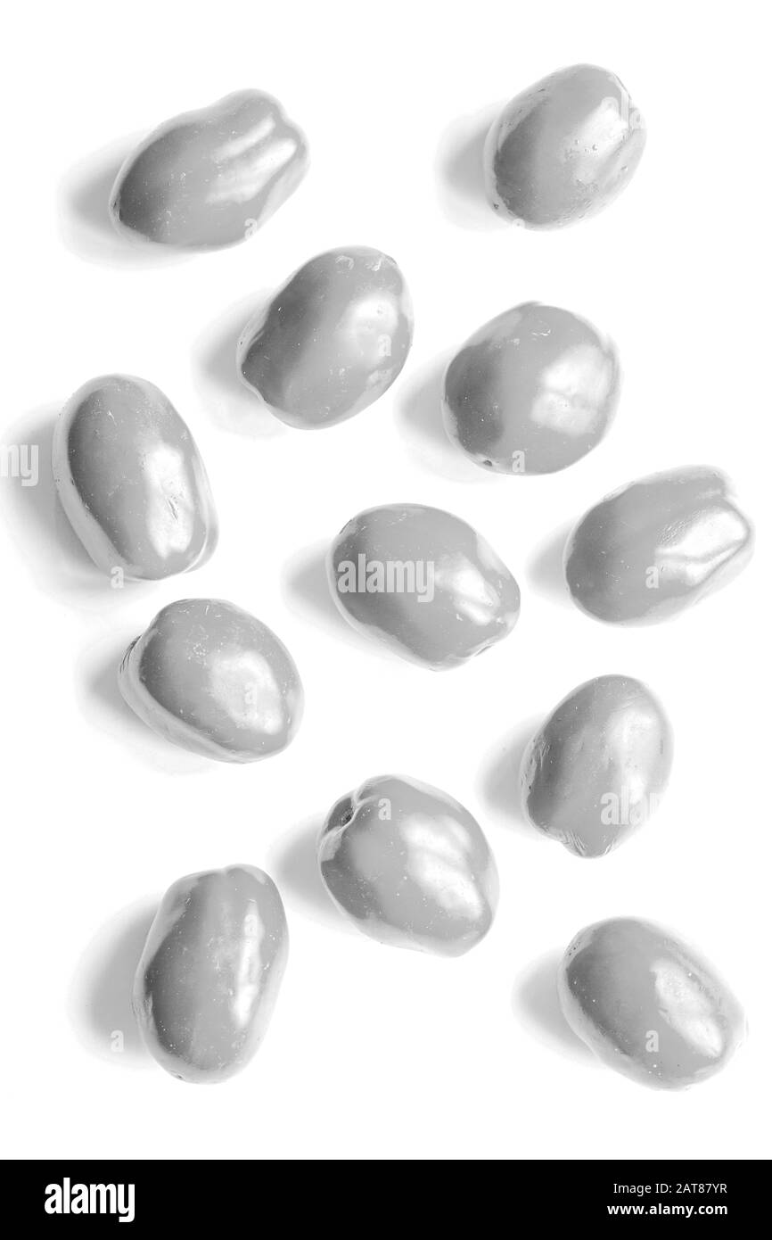 Tomates blanchies sur fond blanc Banque D'Images