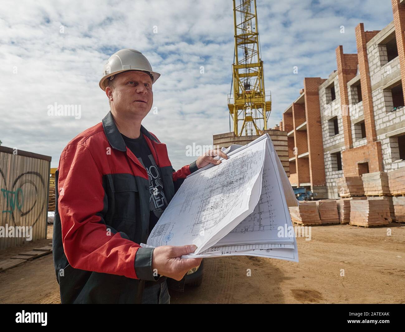 Travailleurs. Briques.Route. Banque D'Images