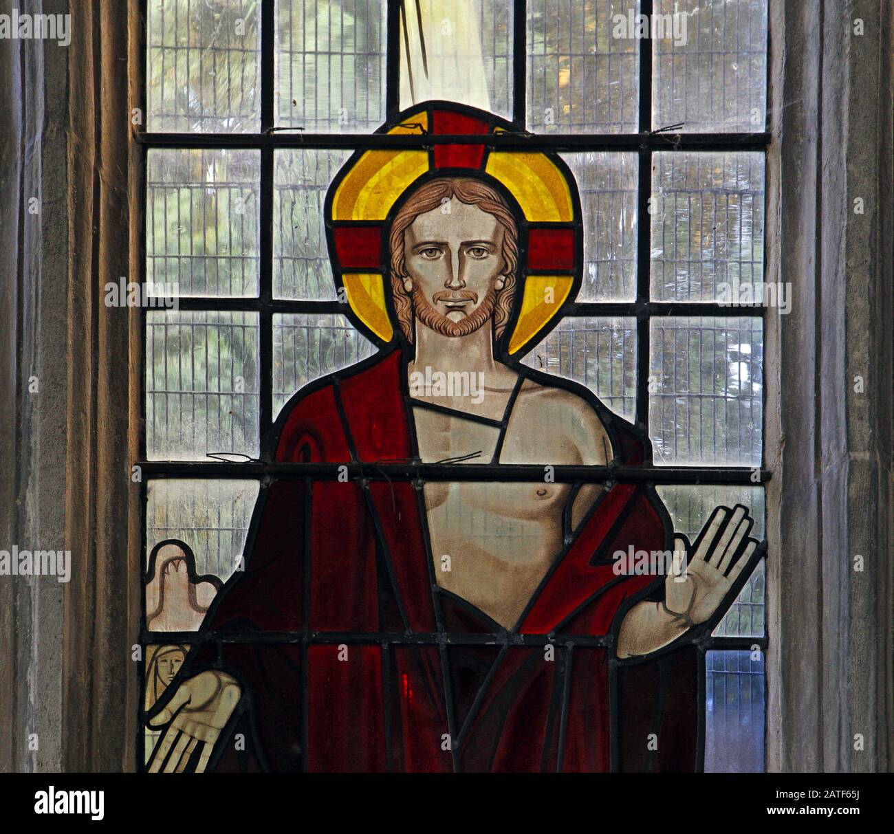 Une vitrail moderne près des studios G. Maile de Canterbury représentant Le Baptême de Jésus-Christ, l'église Ryhall, Rutland Banque D'Images