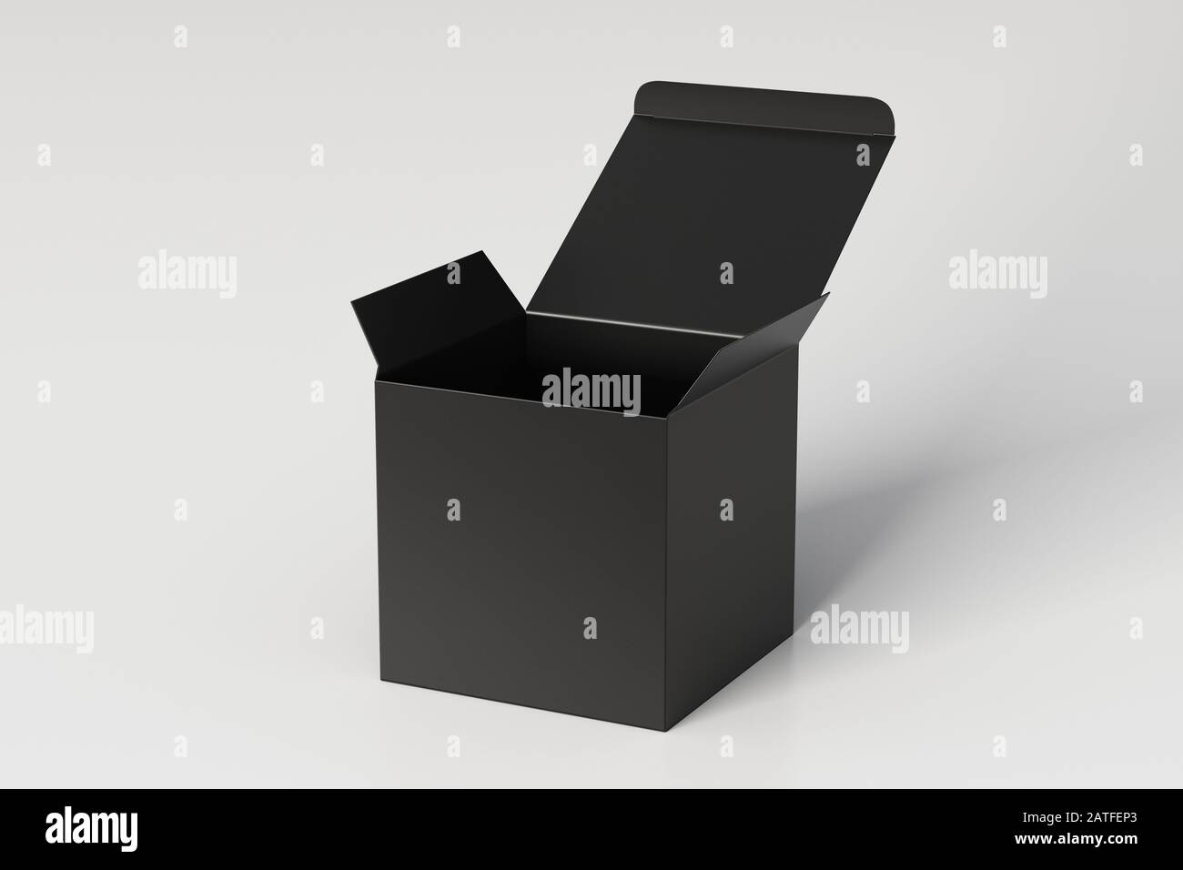 Boîte cadeau cube noire vierge avec couvercle à rabat ouvert sur fond blanc. Chemin de détourage autour de la maquette de boîte Banque D'Images