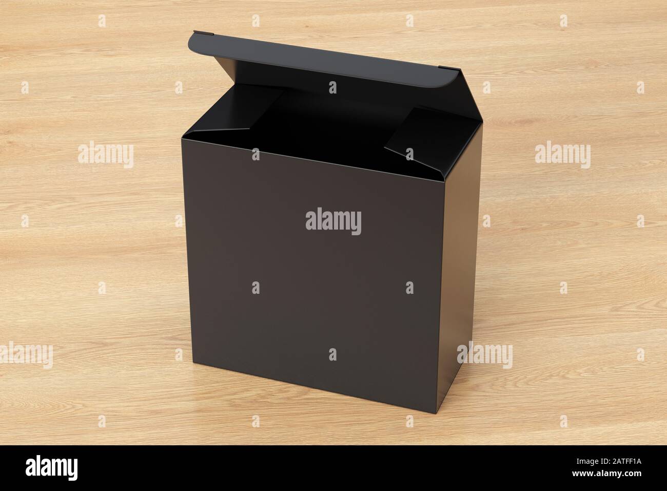 Boîte carrée large noire vierge avec couvercle à rabat ouvert sur fond en bois. Chemin de détourage autour de la maquette de boîte Banque D'Images