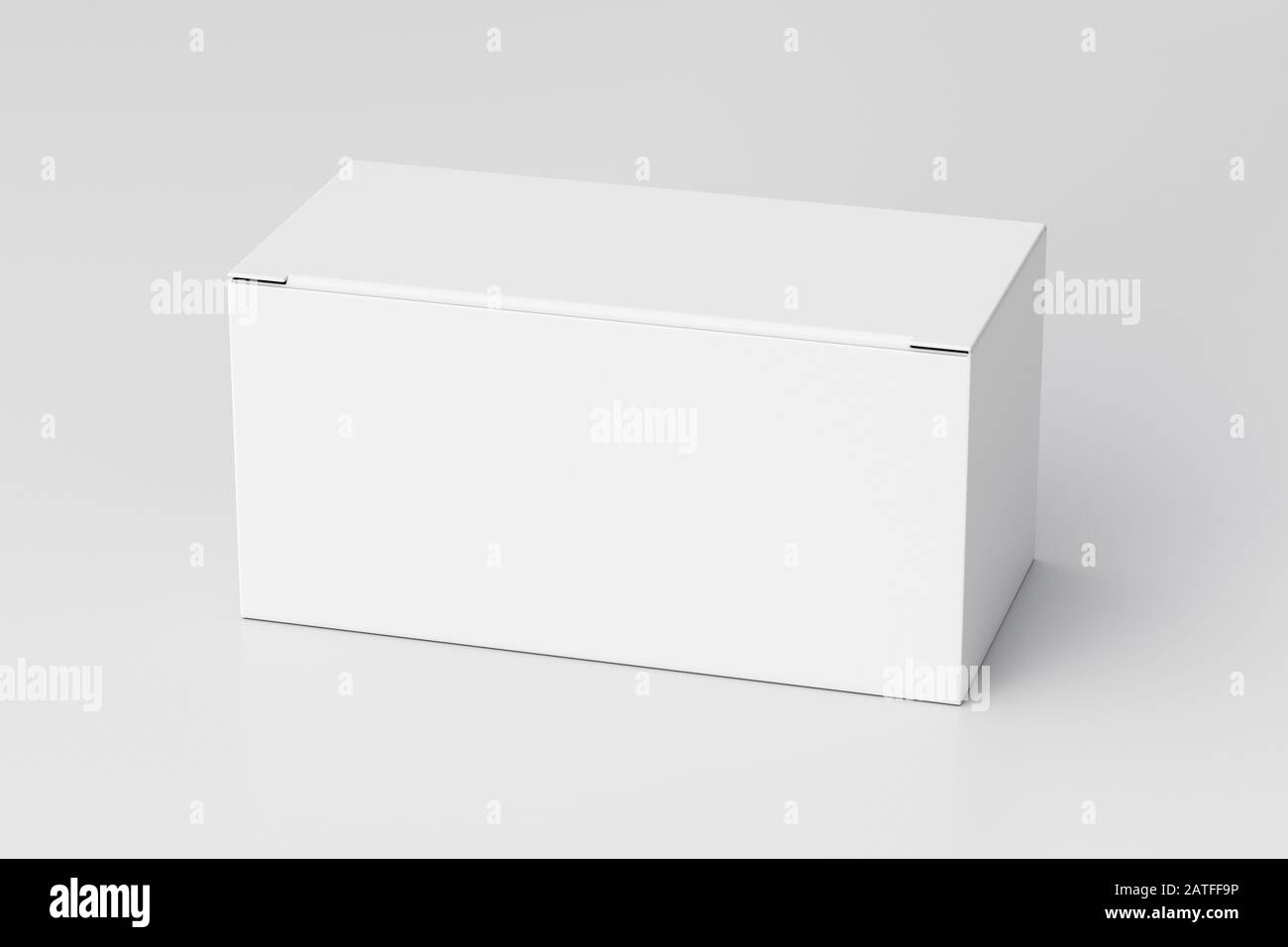 Boîte large blanche vierge avec couvercle à rabat fermé sur fond blanc. Chemin de détourage autour de la maquette de boîte Banque D'Images