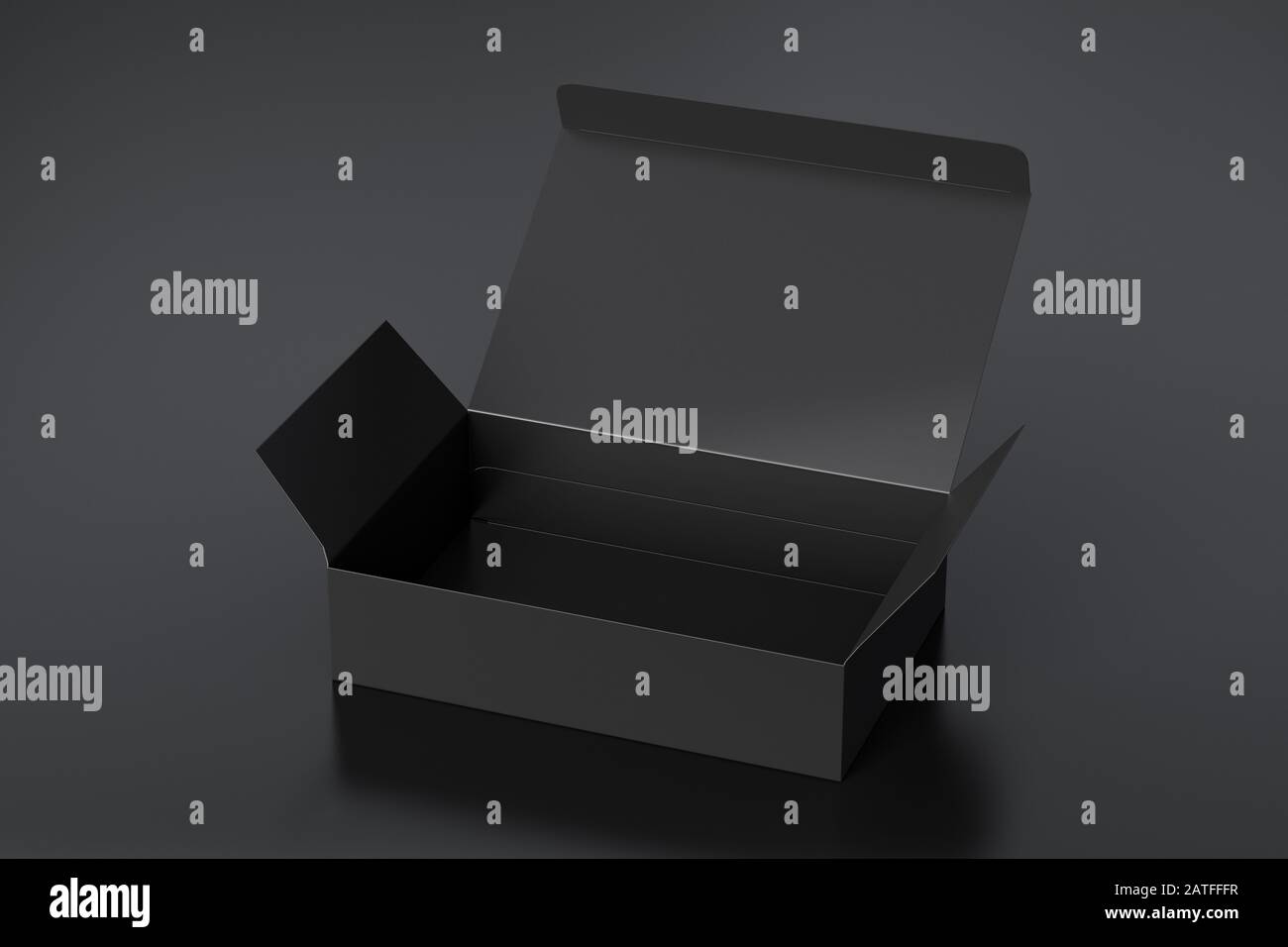 Boîte plate large noire vierge avec couvercle à rabat ouvert sur fond noir. Chemin de détourage autour de la maquette de boîte Banque D'Images