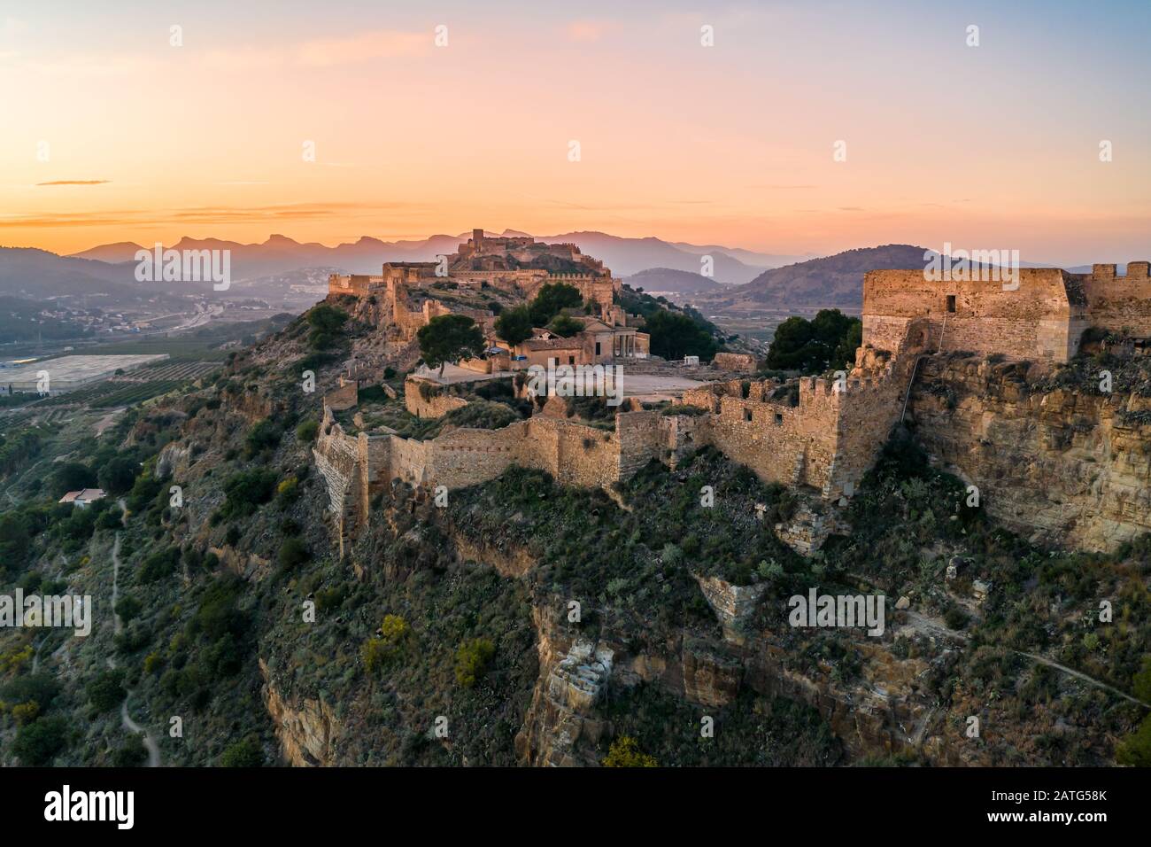 Vue panoramique sur le coucher de soleil de la forteresse de Sagunto (Sagunt) près de Valence Espagne Banque D'Images