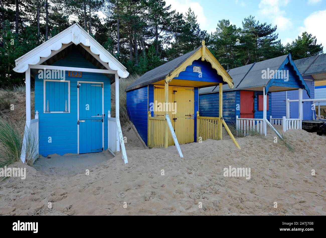 dévastation de sable sur les huttes de plage, puits-next-the-sea, nord norfolk, angleterre Banque D'Images