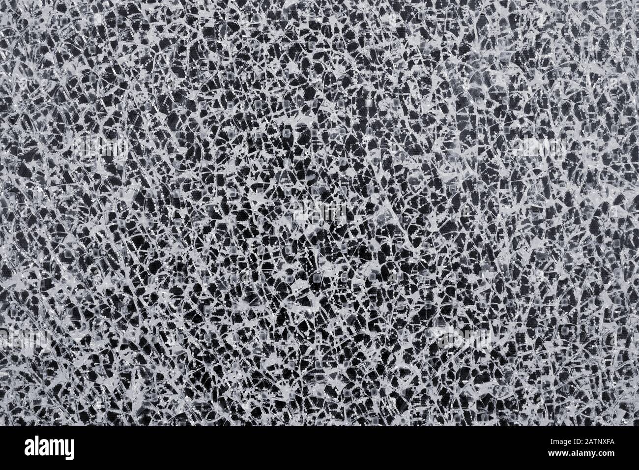 Motif blanc abstrait d'une vitre fissurée Banque D'Images