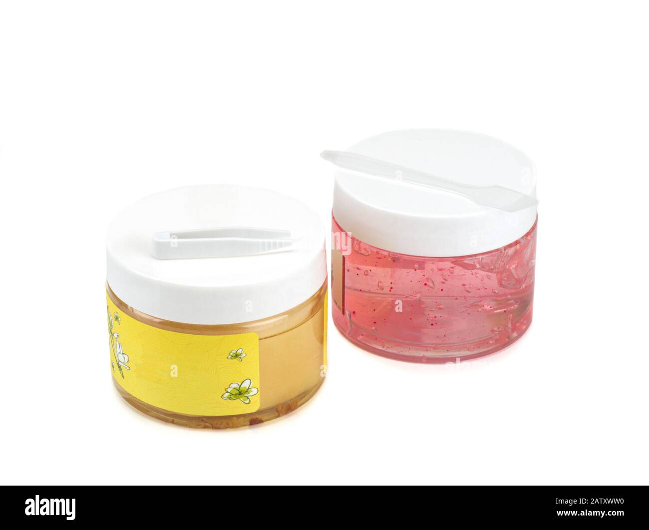 Texture du gel crème cosmétique et taches oculaires isolées Sur fond blanc. Banque D'Images