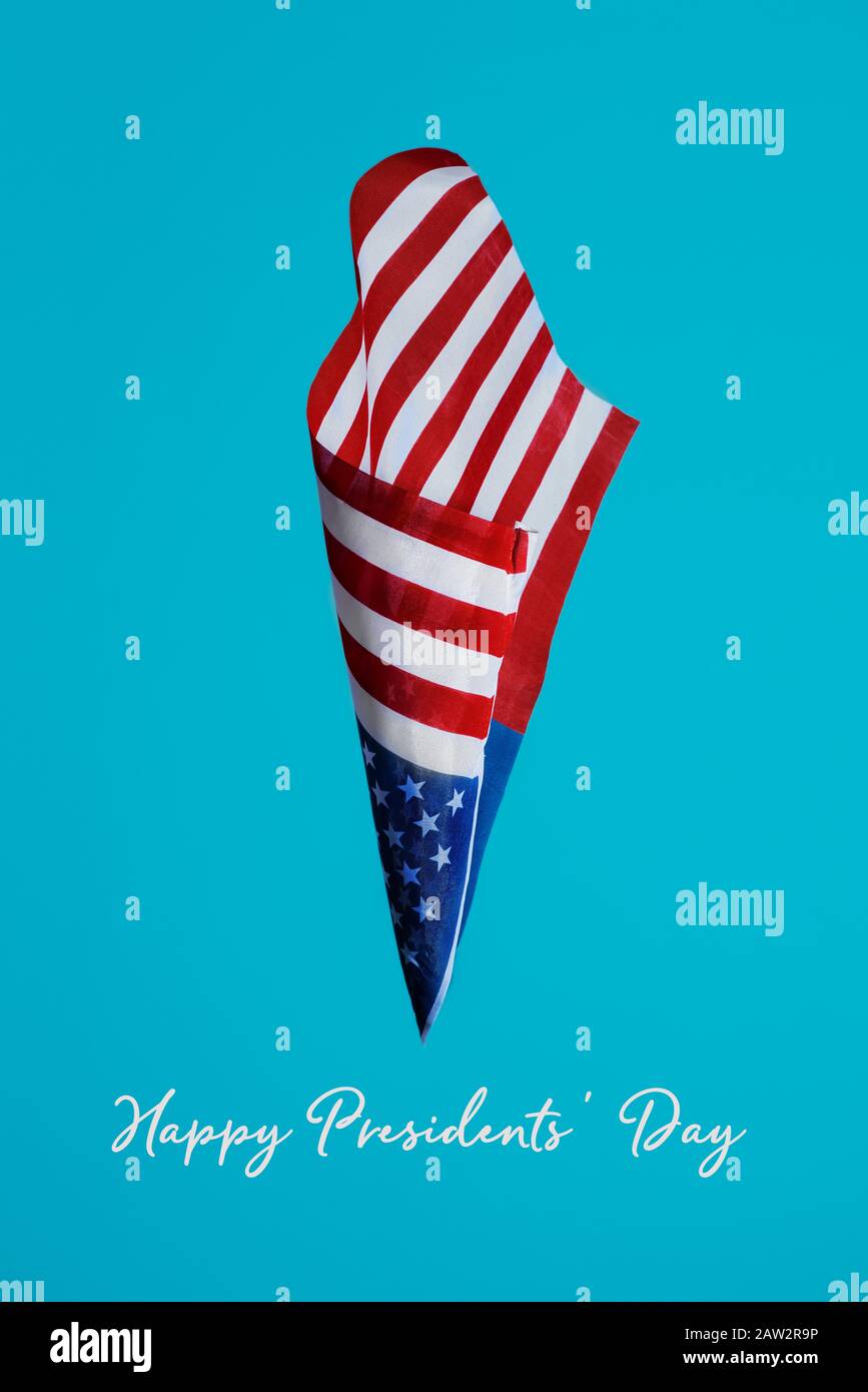 le texte des présidents heureux jour et un drapeau américain volant sur un fond bleu Banque D'Images