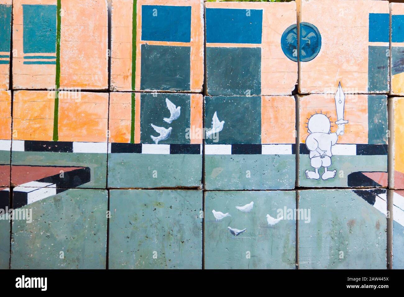Egypte, le Caire, graffitis de la révolution égyptienne. Trompe-l'oeil peint sur de grands blocs de béton bloquant les rues. Banque D'Images
