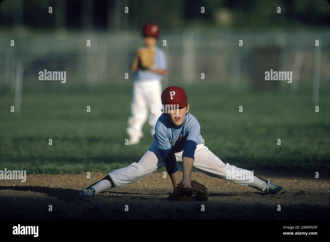 Austin, Texas: Petit match de base-ball de ligue pour les jeunes de neuf à onze ans. ©Bob Daemmrich Banque D'Images
