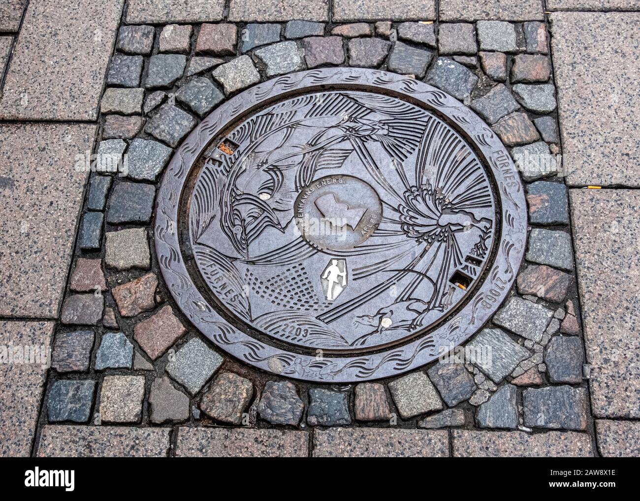La couverture de trou d'homme conçue par Peter Hentze illustre l'histoire de Hans Christian Andersen, le Soldier De l'étain Ferme. Copenhague, Danemark Banque D'Images