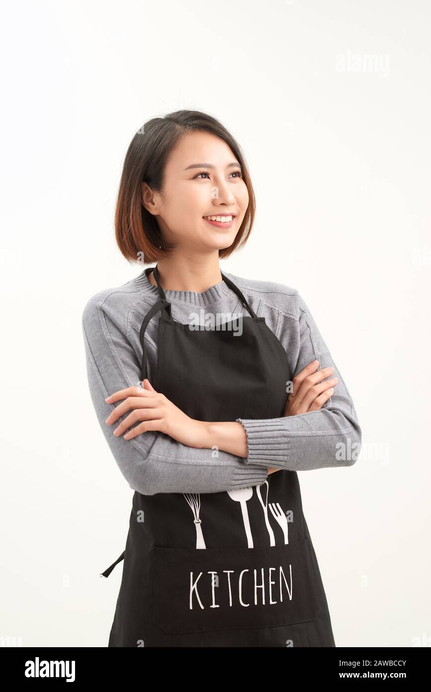 Vendeuse ou petit magasin propriétaire isolé sur fond blanc. Souriante jeune femme. Banque D'Images