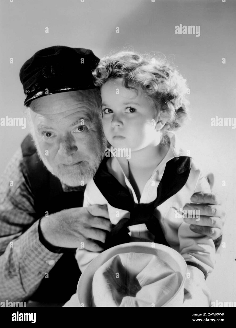 1936 , USA : L'enfant actrice SHIRLEY TEMPLE ( 1928-2014 ) avec GUY KIBBEE , pubblica encore pour le film CAPITAINE JANVIER ( Capitan Gennaio ) par Banque D'Images