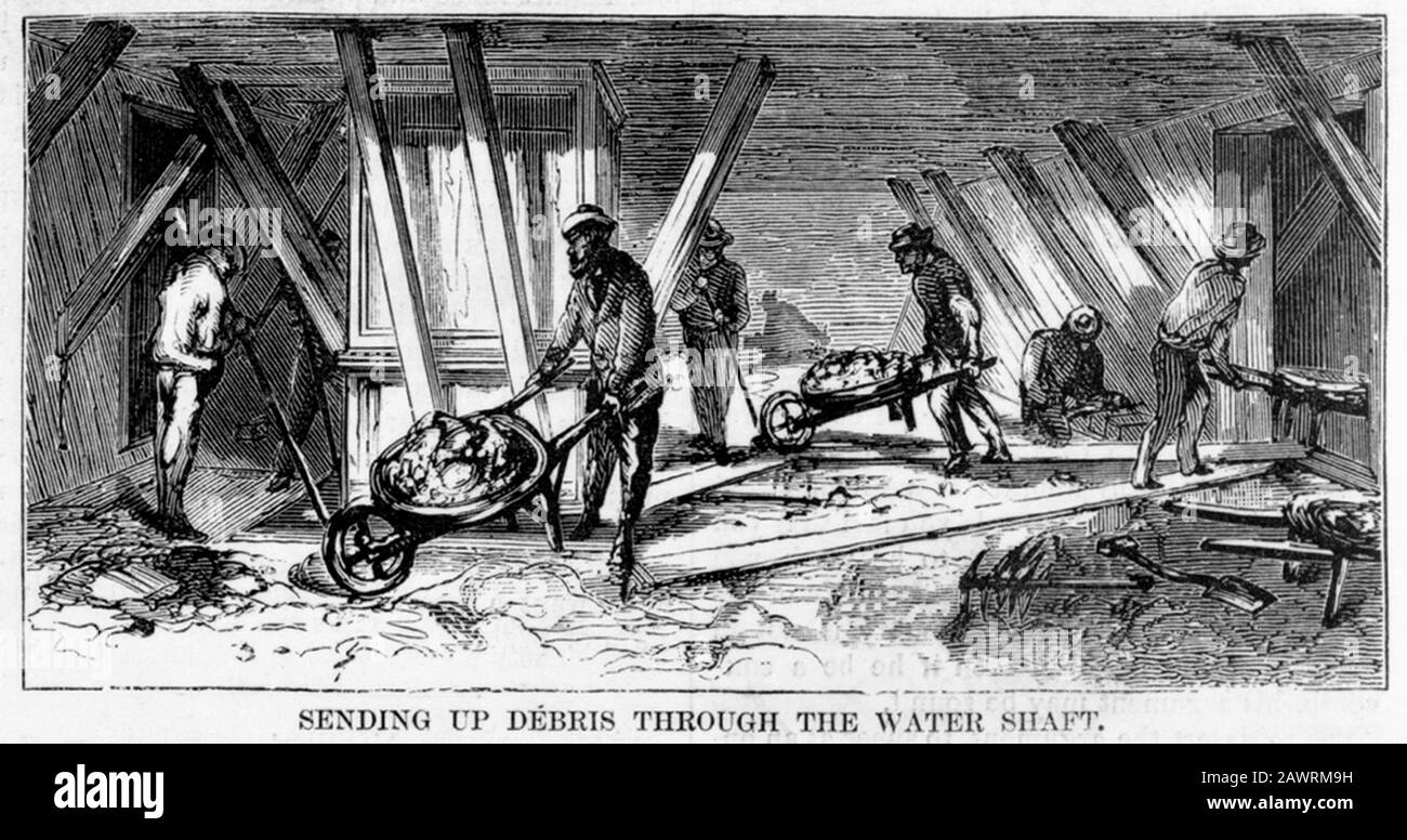 1870 , 17 décembre , NEW YORK , États-Unis : le pont East River : le quai de Brooklyn - envoi de débris à travers l'arbre d'eau , fondation de BROOKLYN Banque D'Images