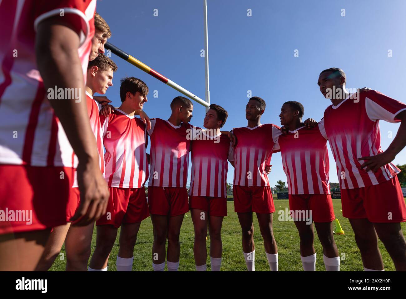 Joueurs de rugby en cercle Banque D'Images