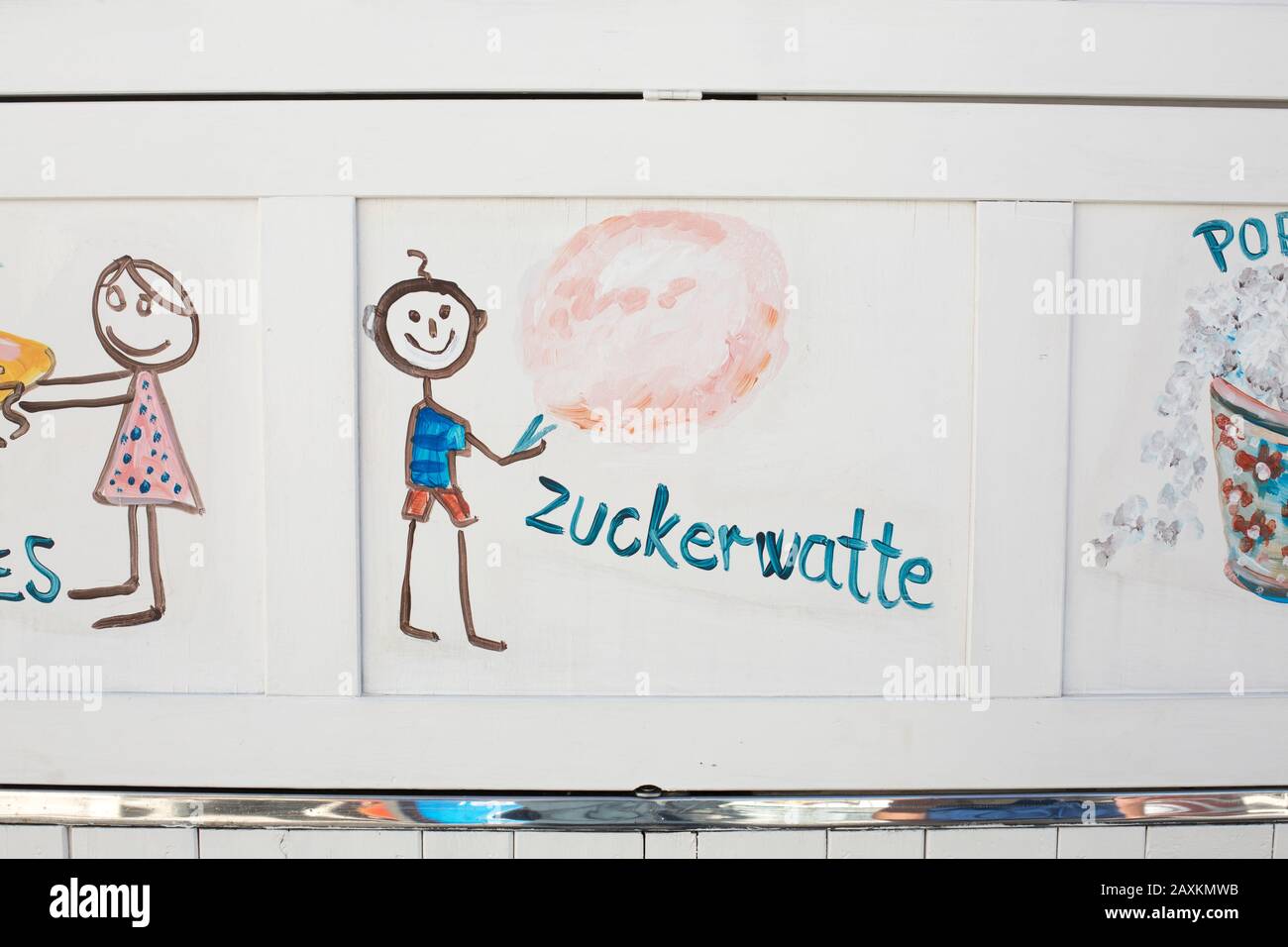 Peinture avec un enfant et des bonbons de coton à la main, Cres/Croatie Banque D'Images