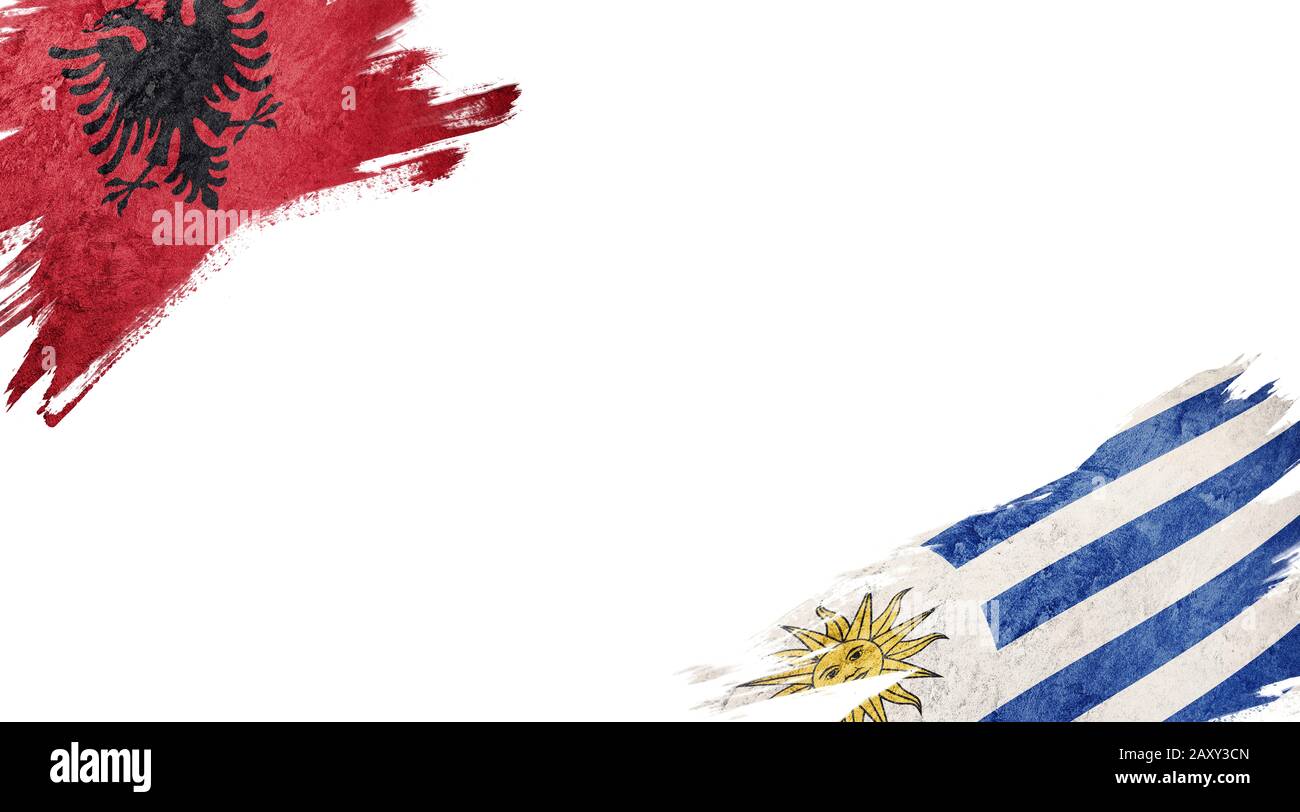 Drapeaux de l'Albanie et de l'Uruguay sur fond blanc Banque D'Images