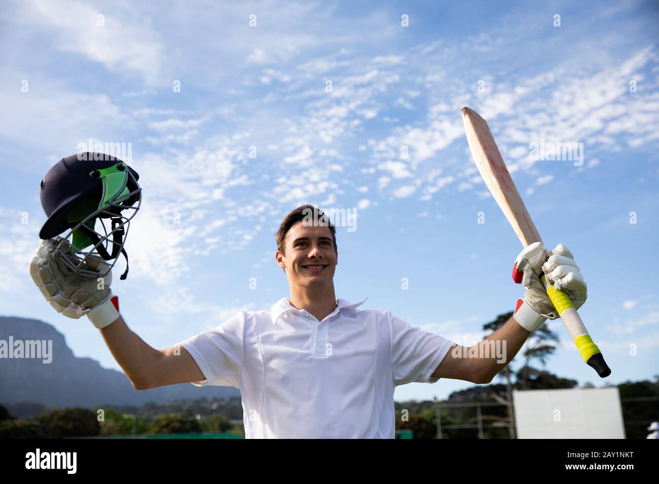 Joueur de cricket heureux après l'entraînement Banque D'Images