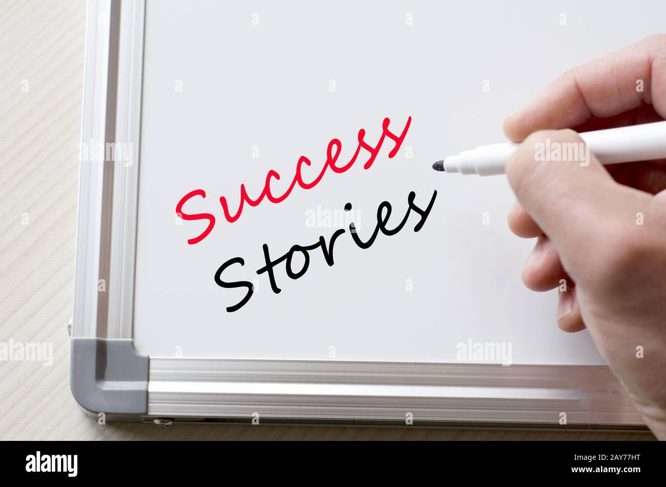 Success stories written on whiteboard Banque D'Images