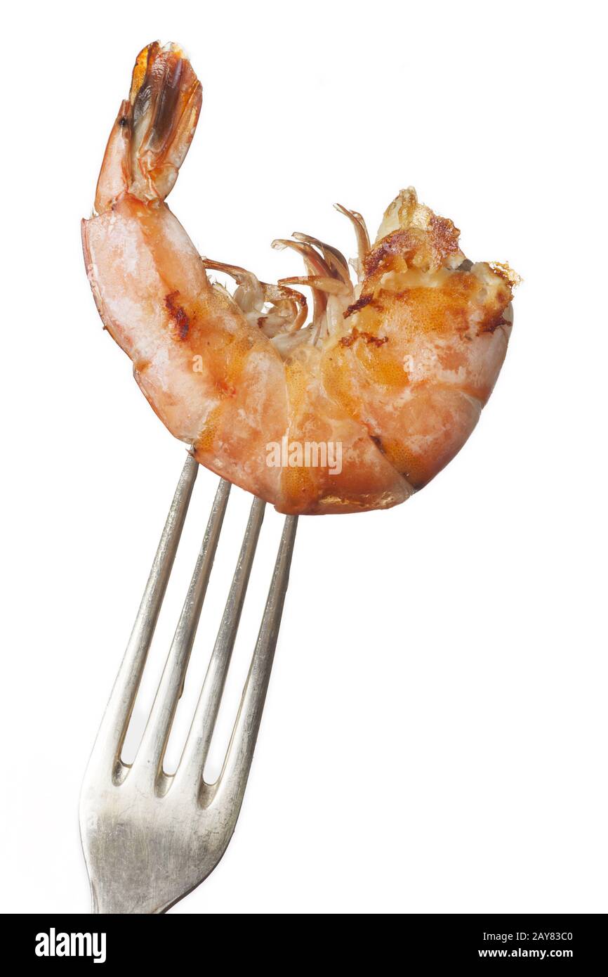 Crevettes grillées sur une fourchette on white Banque D'Images