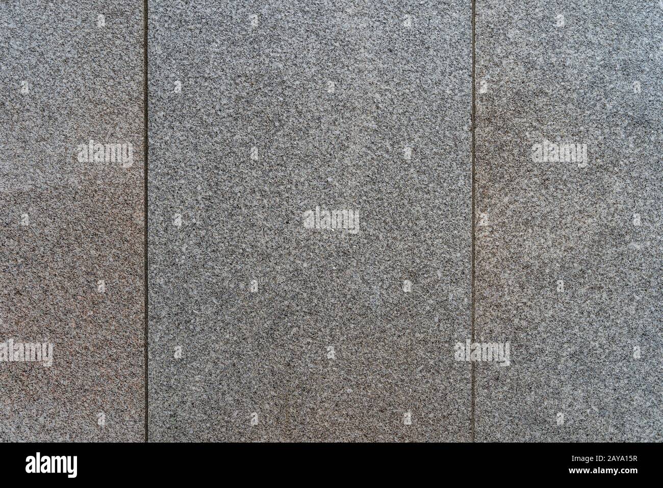 Vieux granit gris avec des motifs fins. Texture et arrière-plan de haute qualité Banque D'Images