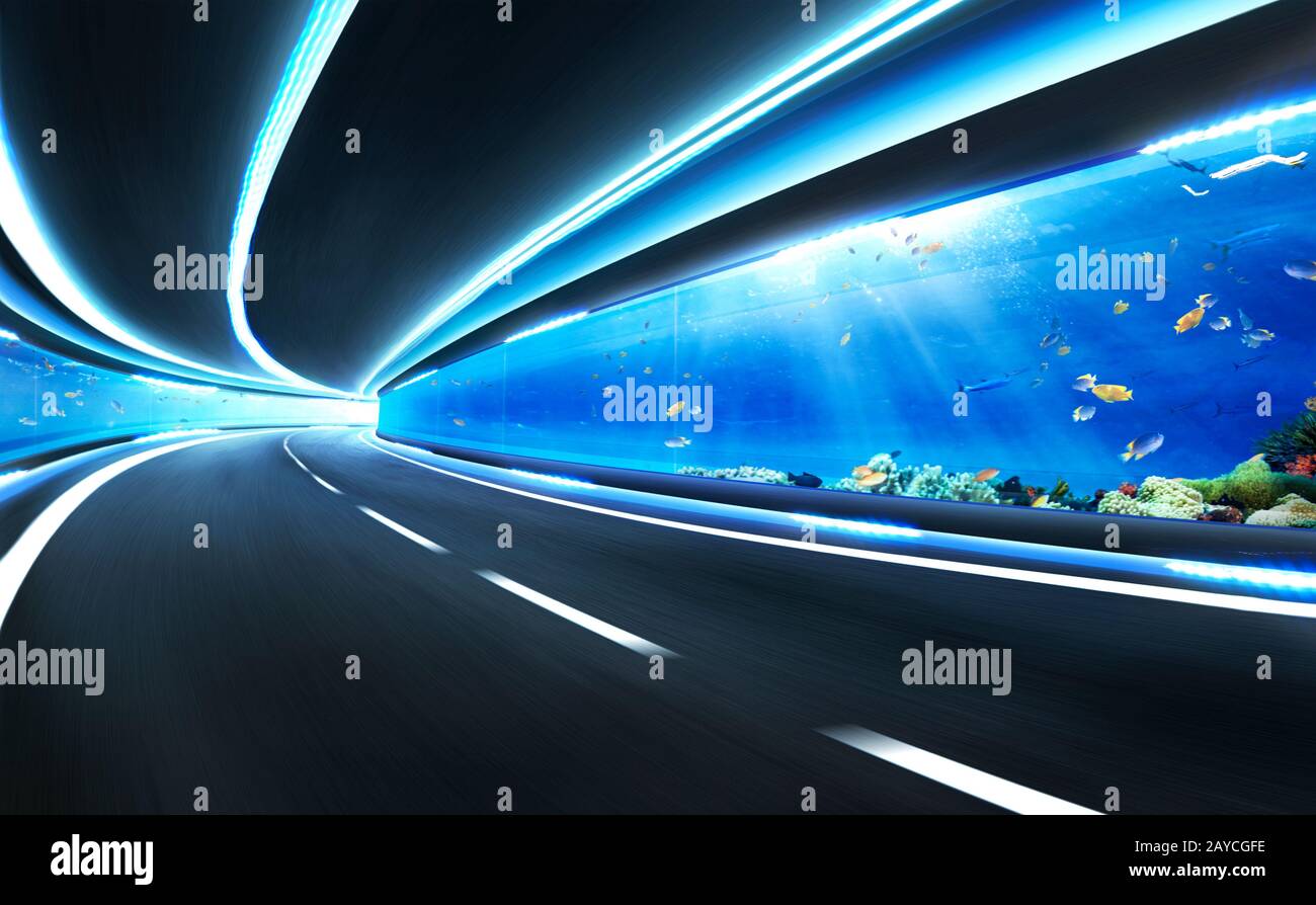 Route de mouvement à vitesse floue abstraite dans un tunnel en verre sous l'eau Banque D'Images