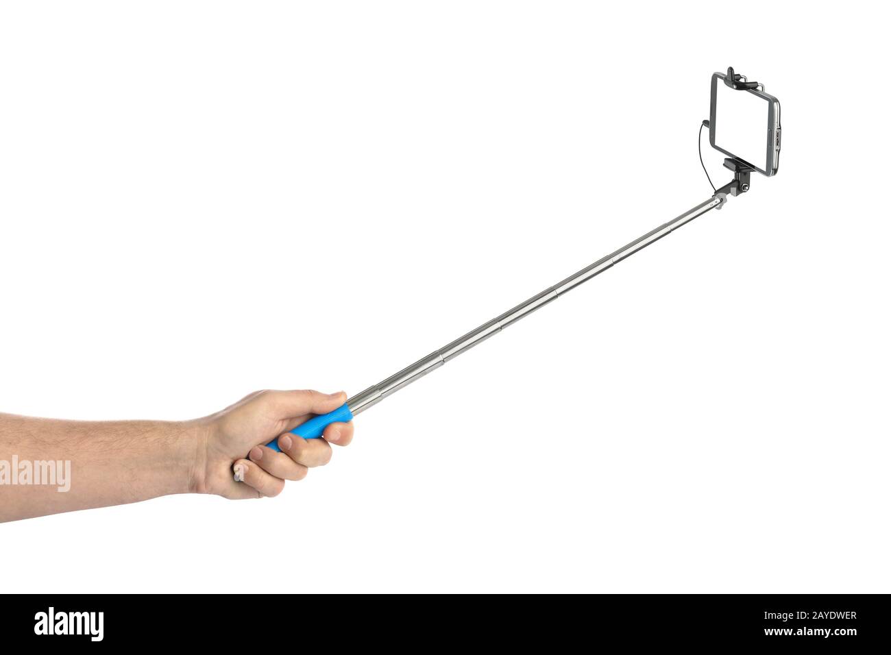 Main et smartphone avec stick selfies Banque D'Images