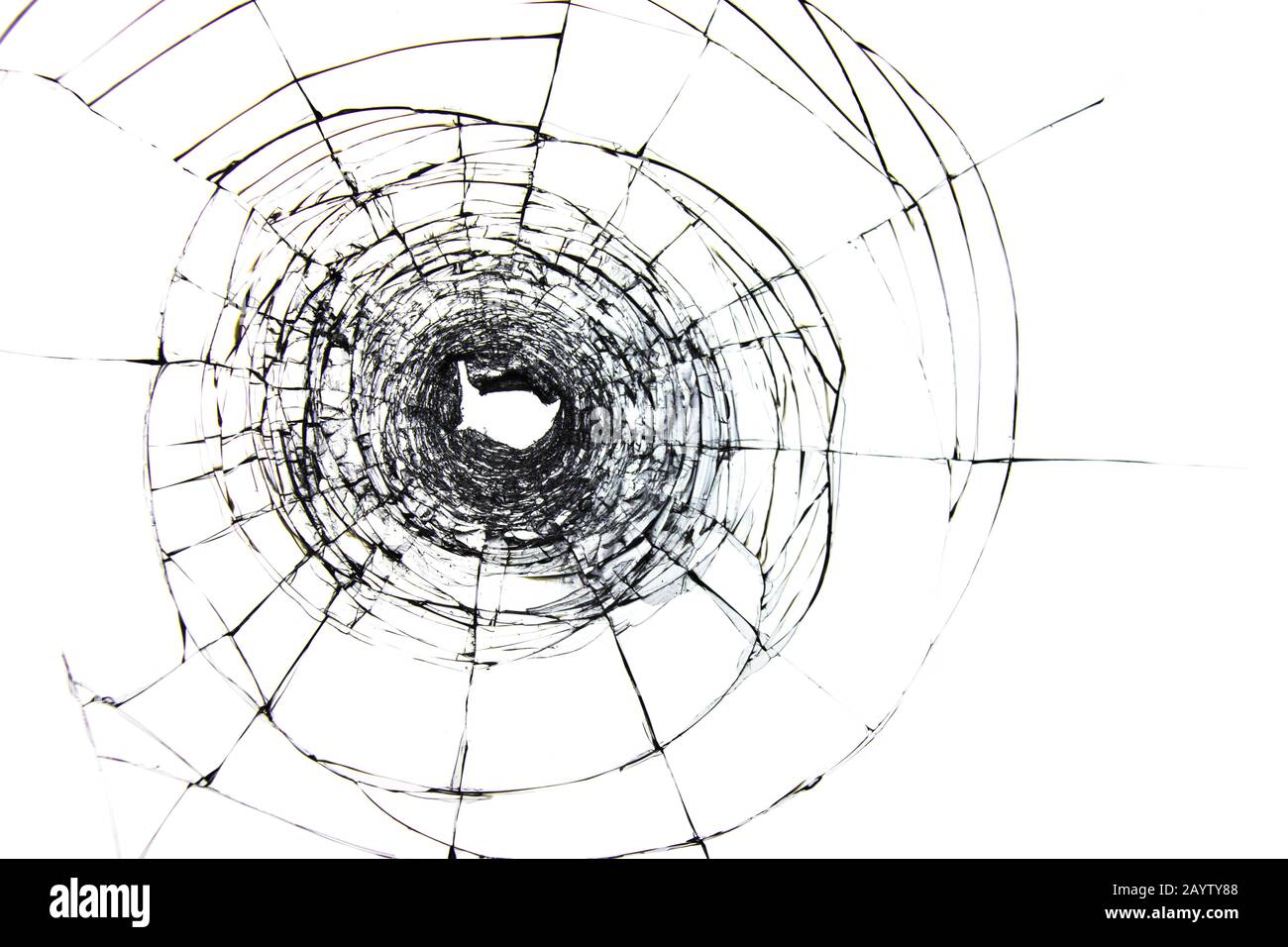 Trou et fissures sur le verre d'un coup d'arme Banque D'Images