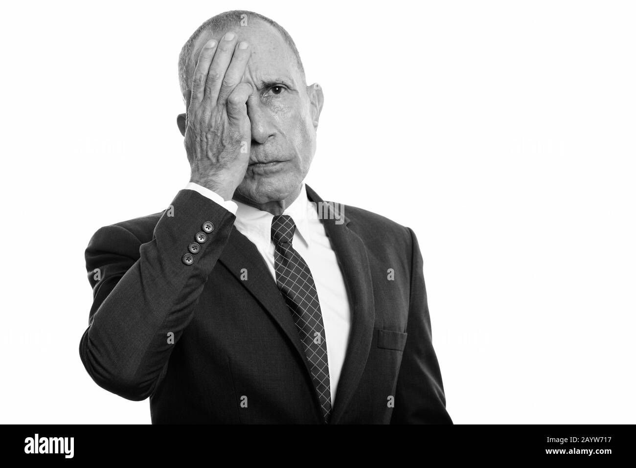 Portrait d'homme d'affaires senior stressé ayant mal à la tête Banque D'Images