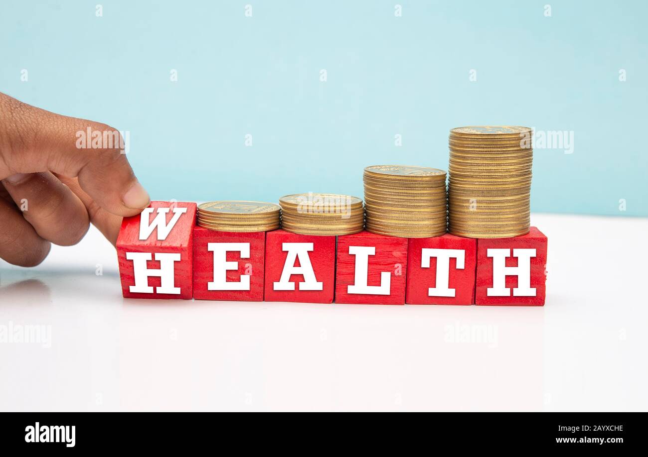 Texte de la santé sur la boîte en bois avec pièces de monnaie, concept médical Banque D'Images