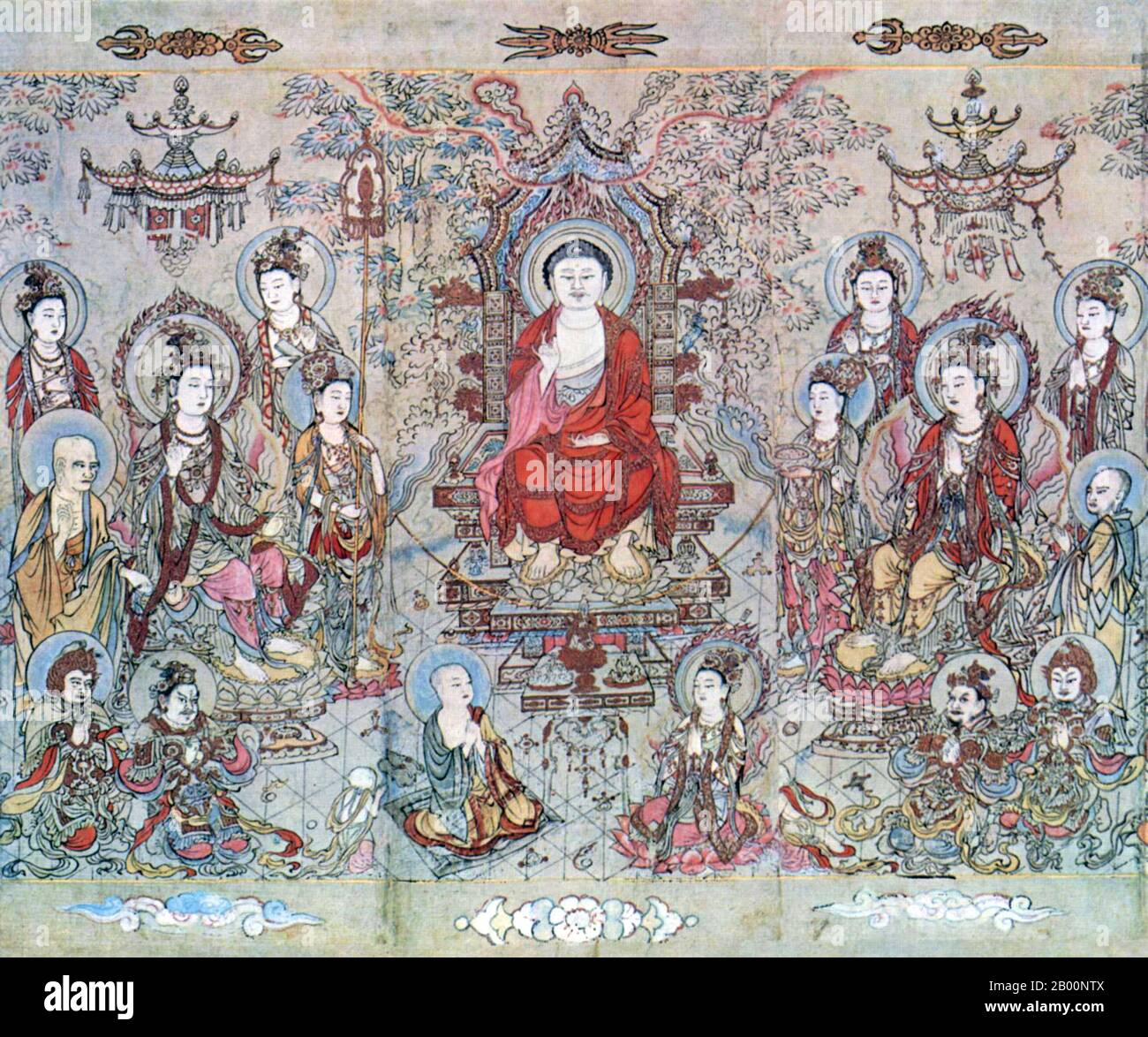 Chine : l'enseignement du Bouddha Sakyamuni. Zhang Shengwen (1100-), Yunnan, 1173–1176 ce. Il y a deux grandes divisions du bouddhisme. Le Sthavira, qui était plus orthoxique, et le Mahasamghika qui tendait à s'appuyer davantage sur les textes. Chacun s'est développé dans différentes écoles, dont il y a de nombreuses sous-divisions. À l'heure actuelle, trois formes principales survivent : une Sthavira, connue sous le nom de Theravada, en Asie du Sud-est, et deux Mahayana, à savoir les traditions chinoise et tibétaine. La tradition Theravada s'est étendue de l'Inde au Sri Lanka et à la Birmanie au 3ème siècle avant notre ère, et de là au Yunnan et en Asie du Sud-est. Banque D'Images