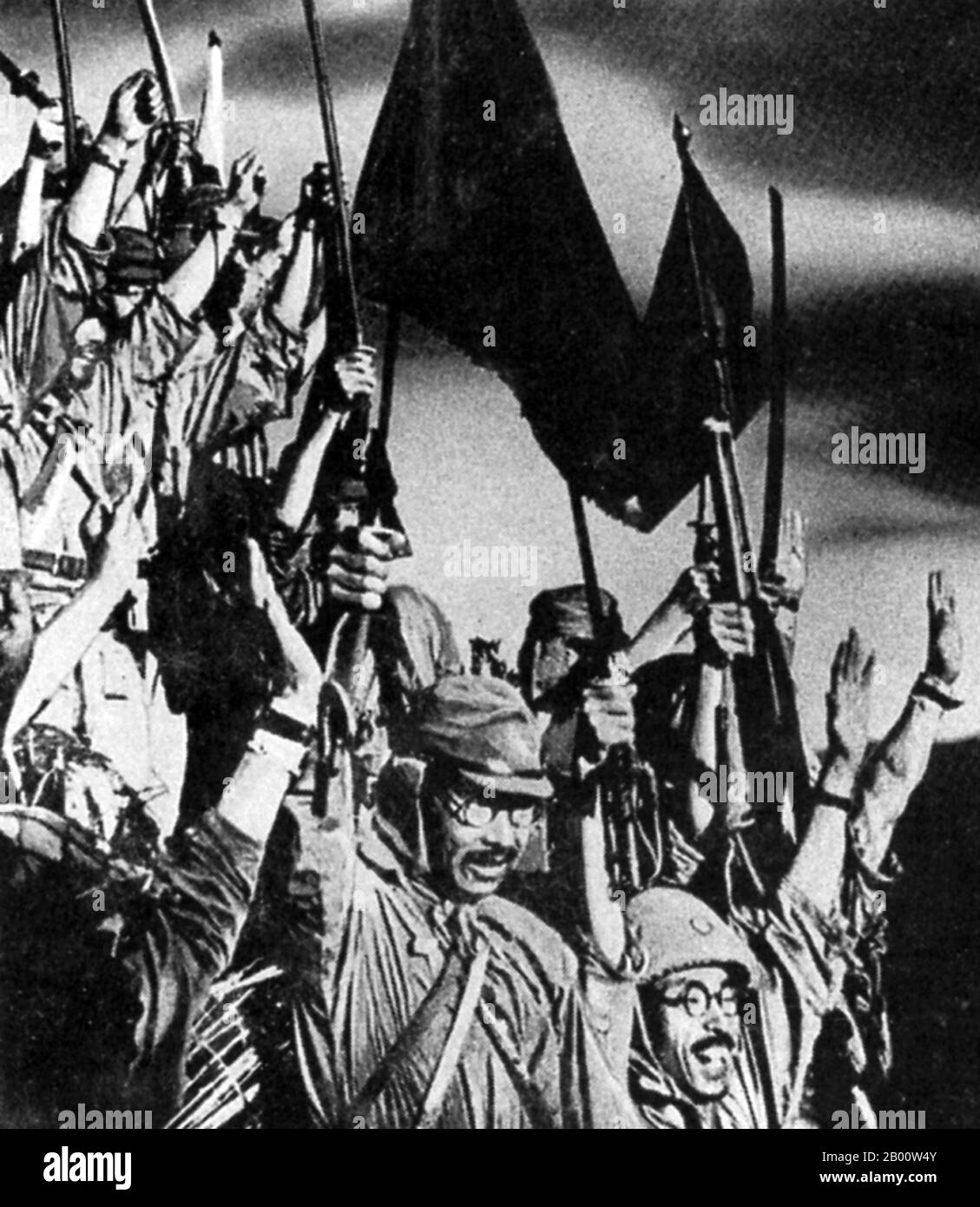 Philippines : les troupes impériales japonaises célèbrent la capture de Bataan en mai 1942. La bataille de Bataan est célèbre dans l'histoire comme l'un des derniers stands de soldats américains et philippins avant d'être submergés par les forces japonaises pendant la Seconde Guerre mondiale Avant l'invasion japonaise de 1941, l'armée américaine a entreposé près de 1,000,000 gallons US d'essence à Bataan. Peu après l'invasion du pays par l'armée japonaise en décembre 1941, les forces américaines et Philippines combinées étaient progressivement déployées et le général Douglas MacArthur a déplacé ses troupes dans la péninsule de Bataan pour tenter de se maintenir. Banque D'Images