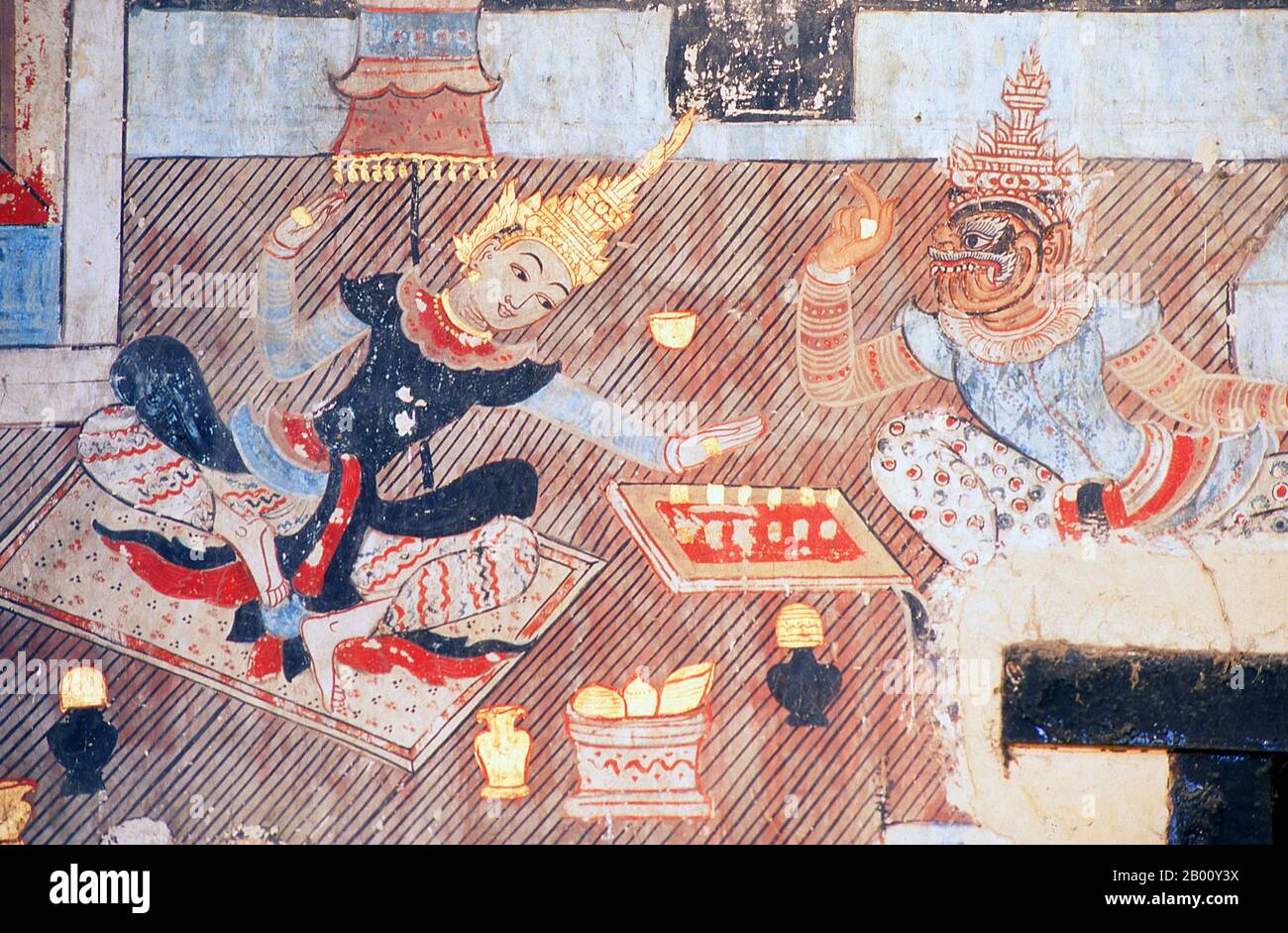 Thaïlande: Le Prince Siddhartha et un démon jouent aux échecs dans une murale à Wat Buak Krok Luang, Chiang Mai, Thaïlande du Nord. Siddhartha Gautama était un professeur spirituel de l'Inde ancienne qui a fondé le bouddhisme. Le moment de sa naissance et de sa mort est incertain : la plupart des historiens du début du XXe siècle ont daté sa vie comme c. 563 BCE à 483 BCE, mais une opinion plus récente date son décès entre 486 et 483 BCE ou, selon certains, entre 411 et 400 BCE. Wat Buak Khrok Luang, situé à Chiang Mai, est un petit temple bouddhiste typiquement thaïlandais du nord, soi-disant fondé au XVe siècle. Banque D'Images