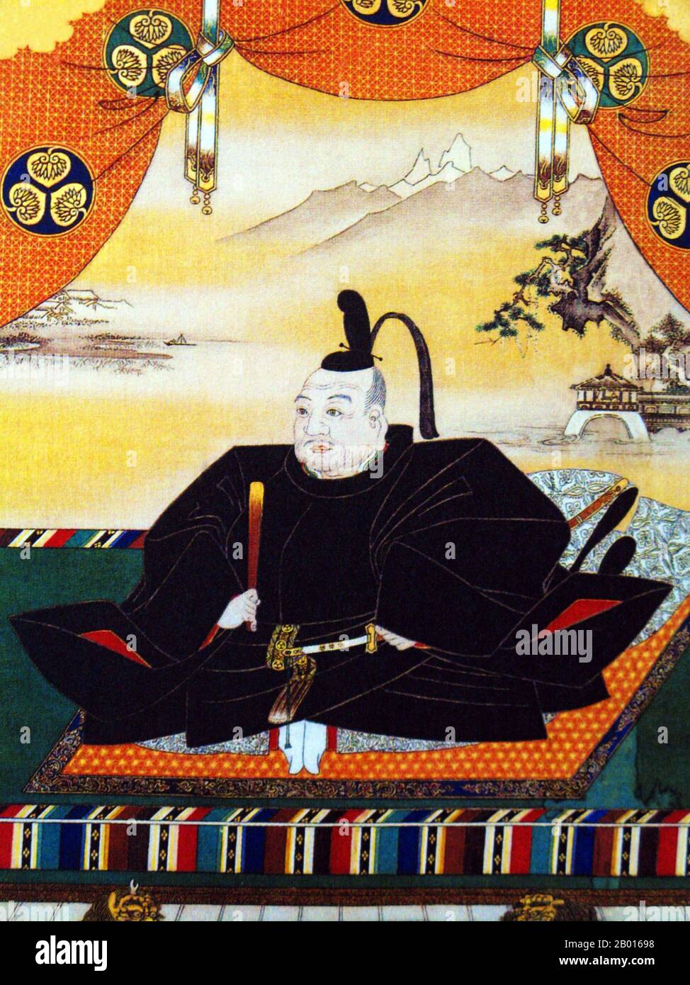 Japon : Tokugawa Ieyasu (31 janvier 1543 – 1er juin 1616), fondateur et premier dirigeant du shogunat Tokugawa (1600-1868).Peinture à la spirale suspendue par Kano Tan'yu (1602-1674), XVIIe siècle.Tokugawa Ieyasu, né Matsudaira Takechiyo, fut le fondateur et le premier shogun du shogunat Tokugawa du Japon, qui régna de la bataille de Sekigahara en 1600 jusqu'à la restauration de Meiji en 1868.Ieyasu a pris le pouvoir en 1600, a reçu une nomination comme shogun en 1603, a renoncé à ses fonctions en 1605, mais est resté au pouvoir jusqu'à sa mort en 1616.Ieyasu a été enchâssé à titre posthume à Nikkō Tōshō-gū. Banque D'Images