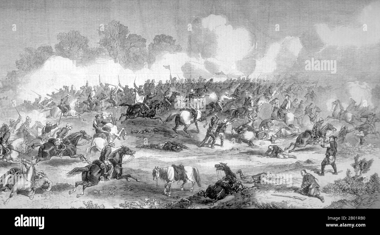 Chine/Royaume-Uni : les King's Dragoon Guards s'engagent avec la cavalerie tartare près de Pékin, le 21 septembre 1860. Gravure de 'The Illustrated London News', 22 décembre 1860. La deuxième guerre de l'opium, la deuxième guerre anglo-chinoise, la deuxième guerre de Chine, la guerre des flèches, ou l'expédition anglo-française en Chine, était une guerre opposant l'Empire britannique et le deuxième Empire français à la dynastie Qing de Chine, qui a duré de 1856 à 1860. Il en résulta une seconde défaite pour la dynastie Qing et conduisit à la légalisation forcée du commerce de l'opium. Des traités plus inégaux signifiaient plus de pertes territoriales pour la Chine. Banque D'Images
