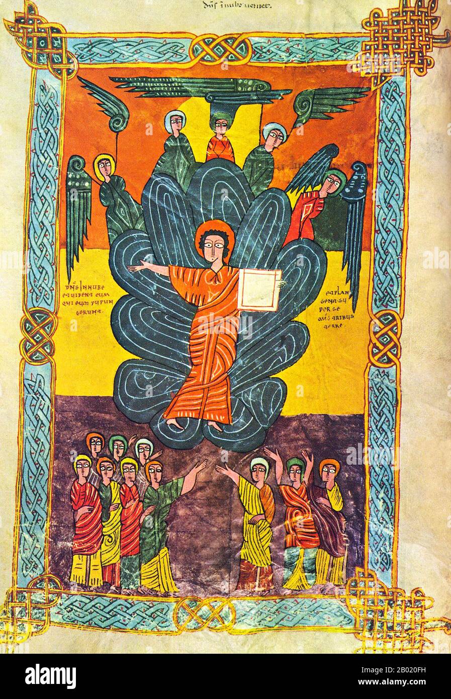 Espagne : le Seigneur dans les nuages. Du Beatus de la Rioja ou Urgell Beatus, v. 975. L'Escorial Beatus est un manuscrit enluminé du Xe siècle du commentaire de l'Apocalypse par Beatus de Liébana. Le manuscrit a probablement été créé au monastère de San Millán de la Cogolla. Il y a 151 folios existants ; le manuscrit est illustré avec 52 miniatures survivantes. L'Apocalypse de Jean est le Livre de l'Apocalypse, le dernier livre du Nouveau Testament. Banque D'Images