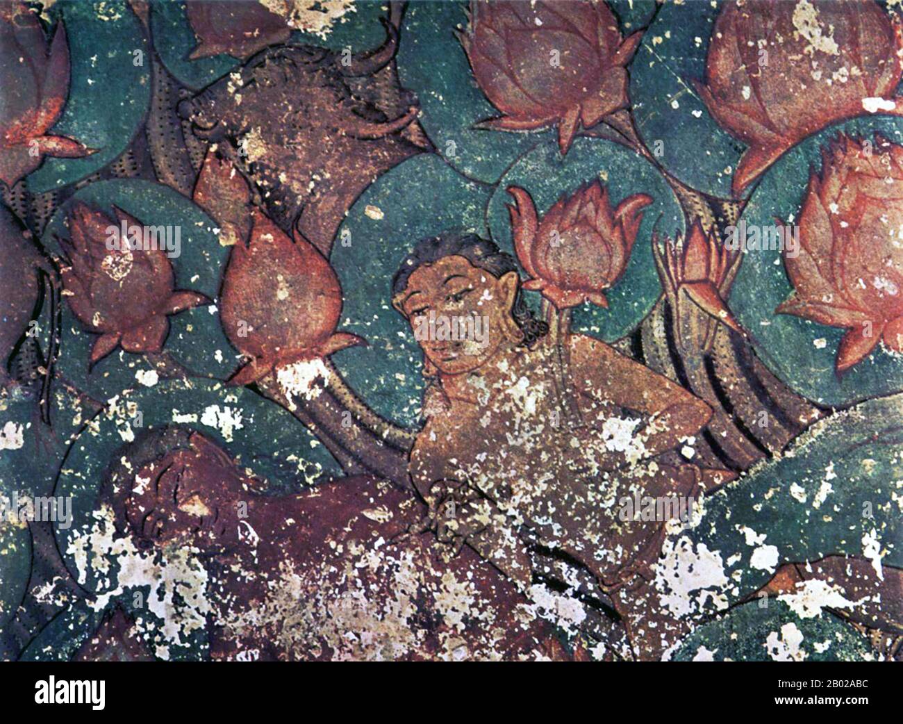 Sittanavasal (nom tamoul: சித்தன்னவாசல்) est un petit hameau dans le district De Pudukkottai de Tamil Nadu, Inde. La grotte de Sittanavasal, également connue sous le nom d'Arivar Kovil, est un monastère de Jain du VIIe siècle, de petite taille, creusé dans un escarpement sur la pente occidentale de la colline dans son centre. Il est noté pour ses peintures qui ont été peintes en fresco-secco technique avec de nombreuses couleurs minérales. Les thèmes de peinture représentent un magnifique étang de lotus et des fleurs, des gens qui collectent des loteries de l'étang, deux figures de danse, des lilas, des poissons, des oies, des buffles et des éléphants. Banque D'Images