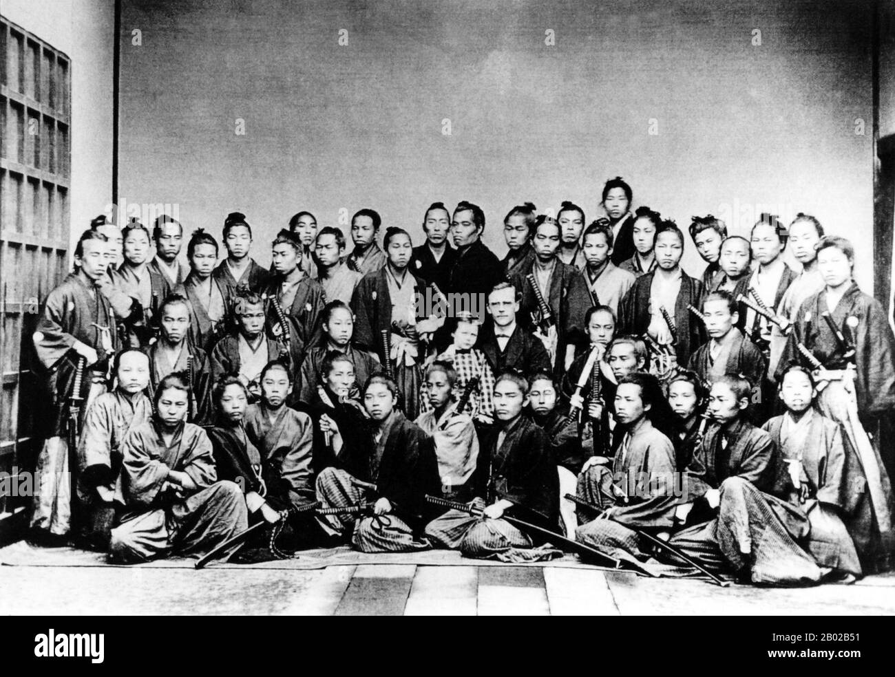 Japon : Guido Verbeck (28 janvier 1830 - 10 mai 1898), conseiller étranger néerlandais du gouvernement japonais Meiji (c. 1862-1898), avec un groupe de samouraïs. Photo de Ueno Hikoma (1838-1904), 1867. Guido Herman Fridolin Verbeck (né Verbeek) était un conseiller politique néerlandais, éducateur et missionnaire actif dans le Bakumatsu et l'époque Meiji au Japon. Il est l'un des plus importants o-yatoi gaikokujin (conseillers étrangers) au service du gouvernement de Meiji et contribue à de nombreuses décisions gouvernementales majeures au cours des premières années du règne de l'empereur Meiji. Banque D'Images