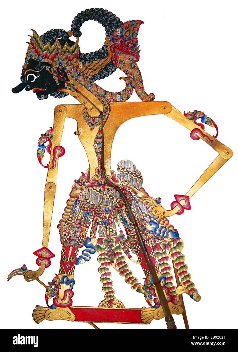 Indonésie : figure d'Antareja, Wayang Kulit (« marionnette d'ombre ») personnage de l'ancienne épopée hindoue, Mahabharata. Wayang est un mot javanais pour certains types de théâtre (littéralement « ombre »). Lorsque le terme est utilisé pour désigner des genres de théâtre de marionnettes, parfois la marionnette elle-même est appelée wayang. Les représentations de théâtre de marionnettes d'ombre sont accompagnées de gamelan à Java. Anantaraja, ou plus souvent abrégé Antareja, est l'un des personnages de marionnettes qui ne sont pas contenus dans le Mahabharata original, mais est la création de la littérature javanaise postérieure. Il était le fils aîné de Wrekodara. Banque D'Images