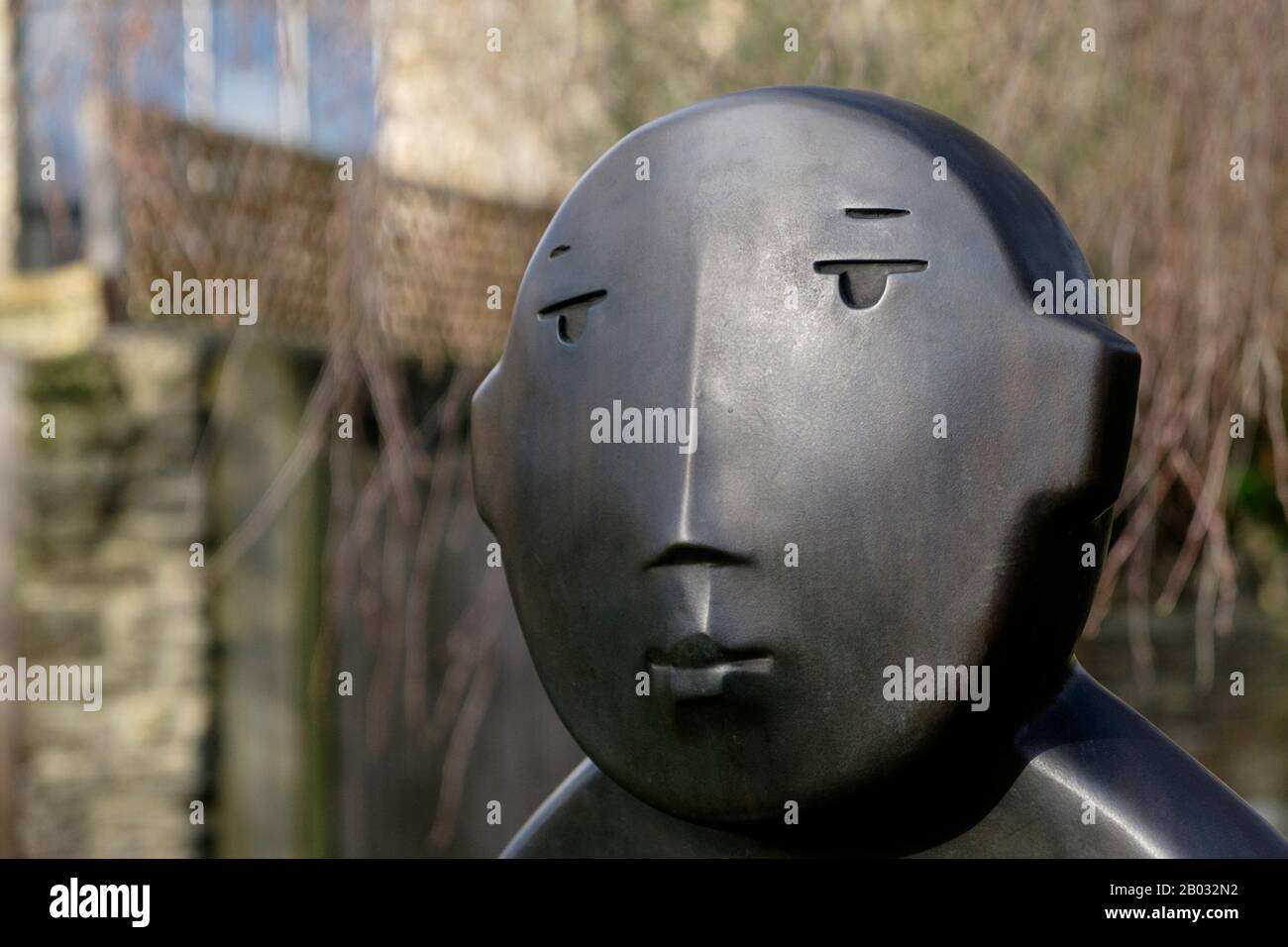 Homme sur un banc, par giles Penny. Autour de Bruton, une petite ville populaire à Somerset, au Royaume-Uni. Banque D'Images