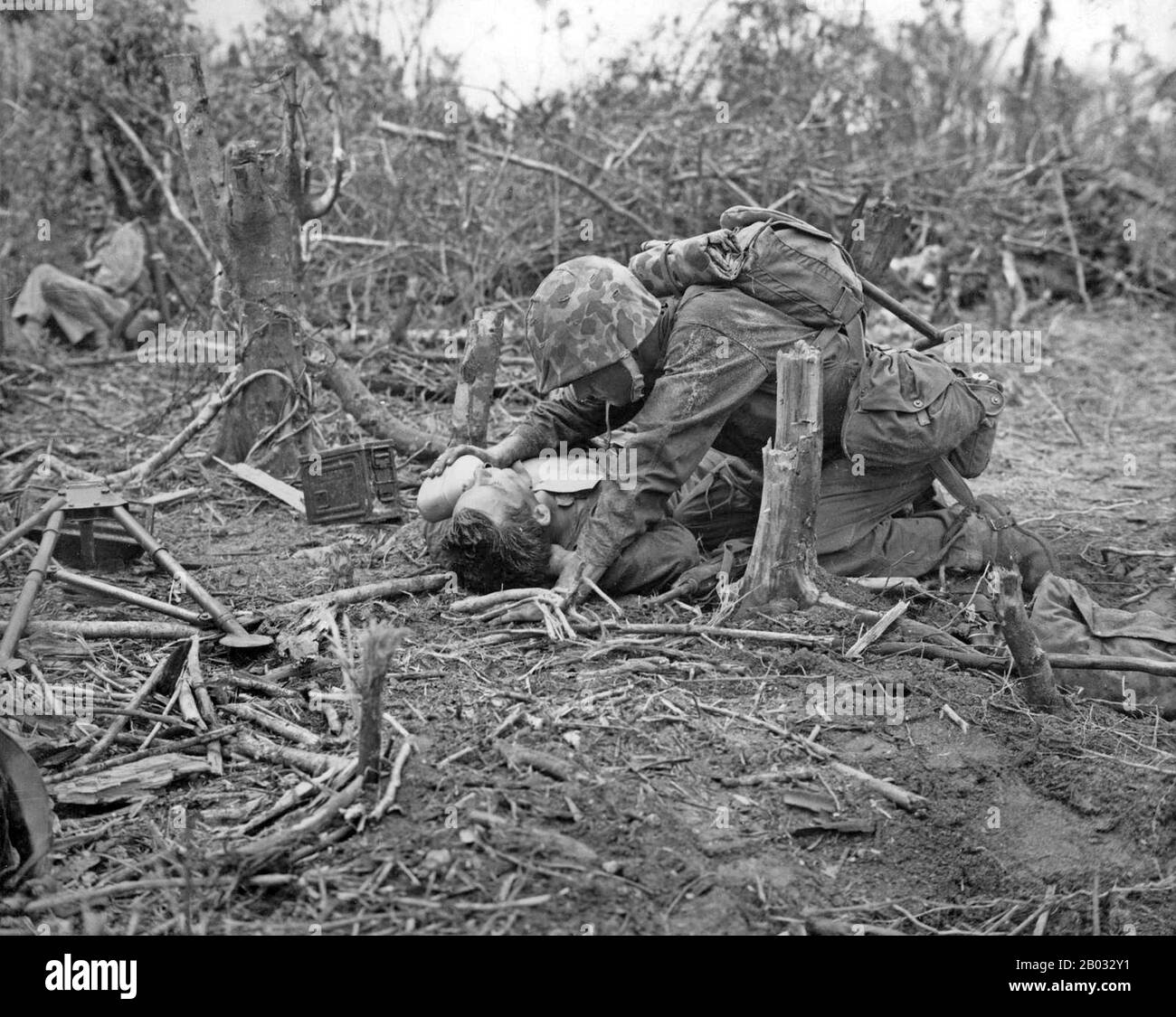 La bataille de Peliu a été combattue entre les Etats-Unis et l'Empire du Japon au Théâtre du Pacifique de la seconde Guerre mondiale, de septembre à novembre 1944 sur l'île de Peliu (aujourd'hui Palau). Les marines américaines de la première division marine, et plus tard les soldats de la 81ème division d'infanterie de l'armée américaine, se sont battus pour capturer une piste d'atterrissage sur la petite île de corail. Cette bataille faisait partie d'une campagne offensive plus vaste connue sous le nom d'opération Forager, qui s'est déroulée de juin à novembre 1944 au Pacific Theatre of Operations. Banque D'Images