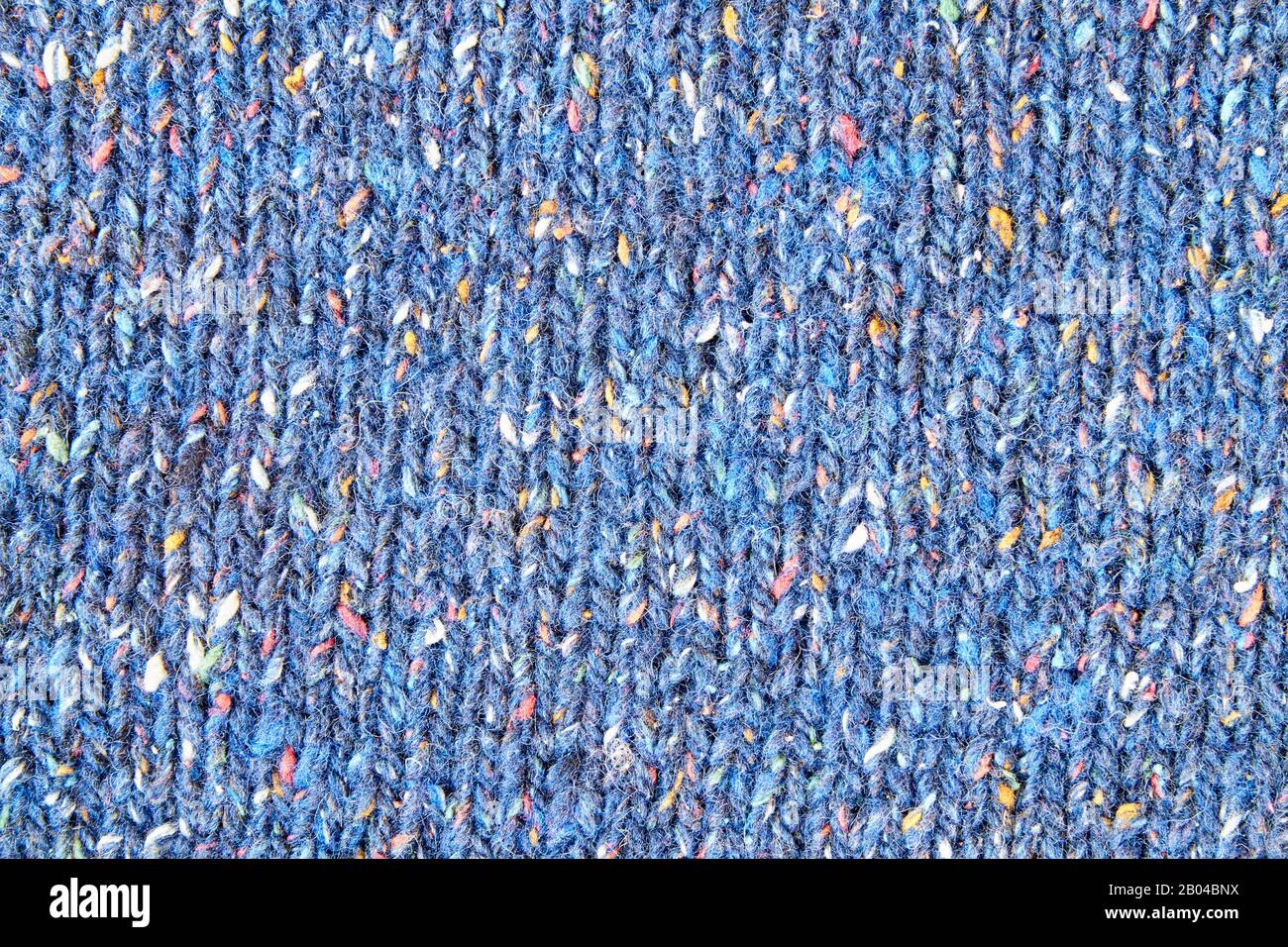Fond texturé tricoté bleu. Gros Plan Banque D'Images