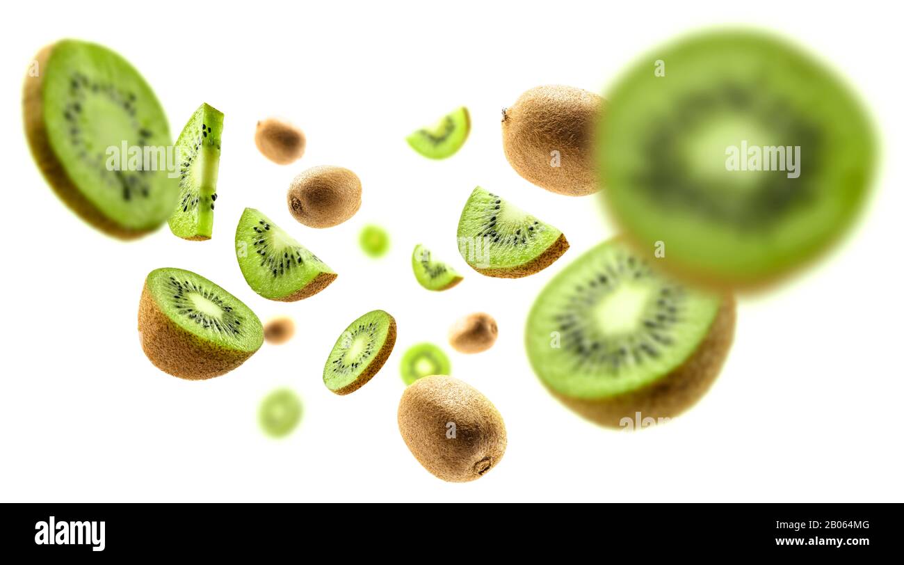 Fruits kiwi lévitant sur un fond blanc Banque D'Images