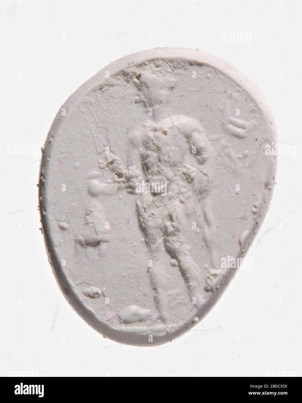 VZ: Dans sa main droite, le dieu a un sac d'argent, dans sa main gauche le caduceaire, dans le champ à ses pieds une tortue sur le sol., Gem, intaglio, pierre circulaire, pâte de verre, nicolo, couleur: Gris Banque D'Images