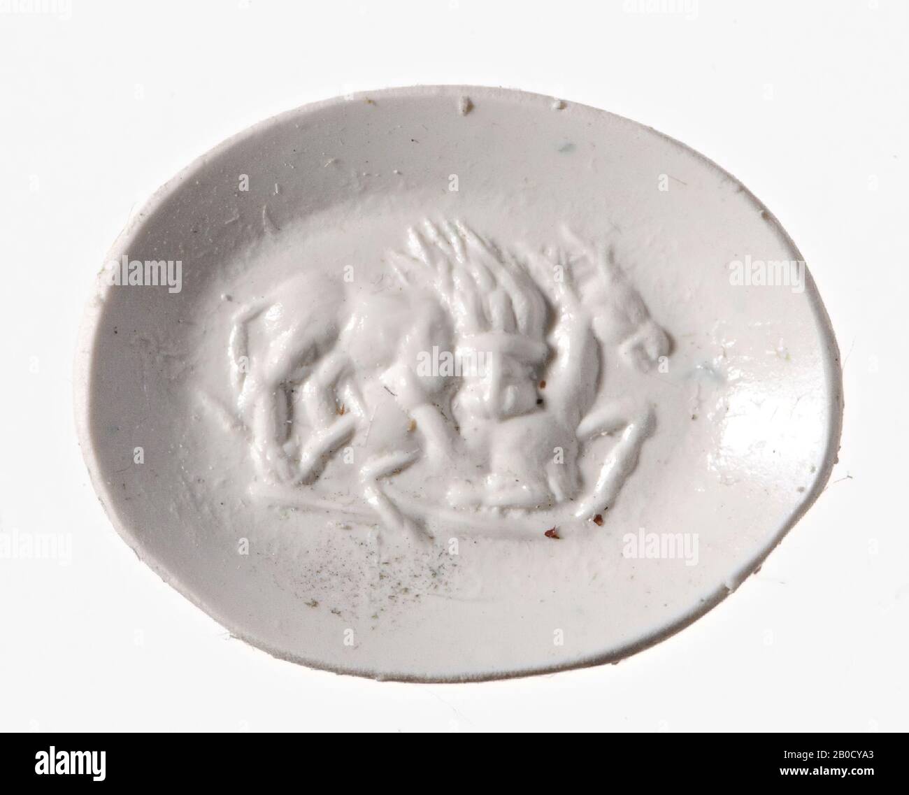 VZ: Un lion vu dans la vue de trois quarts se trouve sur un cerf et morde son flanc., Gem, intaglio, ringstone, agate, couleur: Noir Banque D'Images