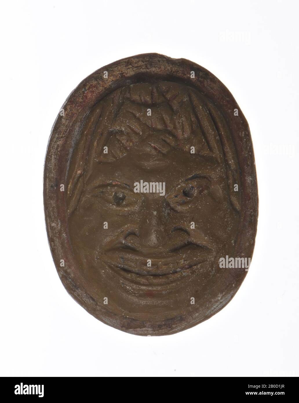 F: Tête d'un homme avec un nez et une bouche proéminents nichés dans un grin, aspect africain, frontal, caméo, jasper, couleur: Brun, forme: Ovale, debout, traitement:, méthode:, 17 x 13 mm D. 4,5 mm, poids. 1.14 gr., xvie siècle? 1500-1600 Banque D'Images