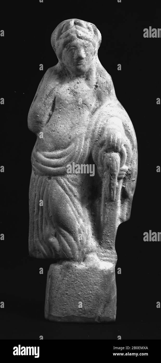 Figurine de pic de Vénus ?. Probablement Keuls fabriqué. Déesse avec dans la main gauche un tonneau reposant sur un pilier, d'où l'eau coule., figure, déesse, déesse de rivière, poterie, terre de pipe, 20.6 x 7.7 x 4.3 cm, roman 150-175 AD, Pays-Bas, South-Holland, Leiden, Leiden, Roomburg Banque D'Images