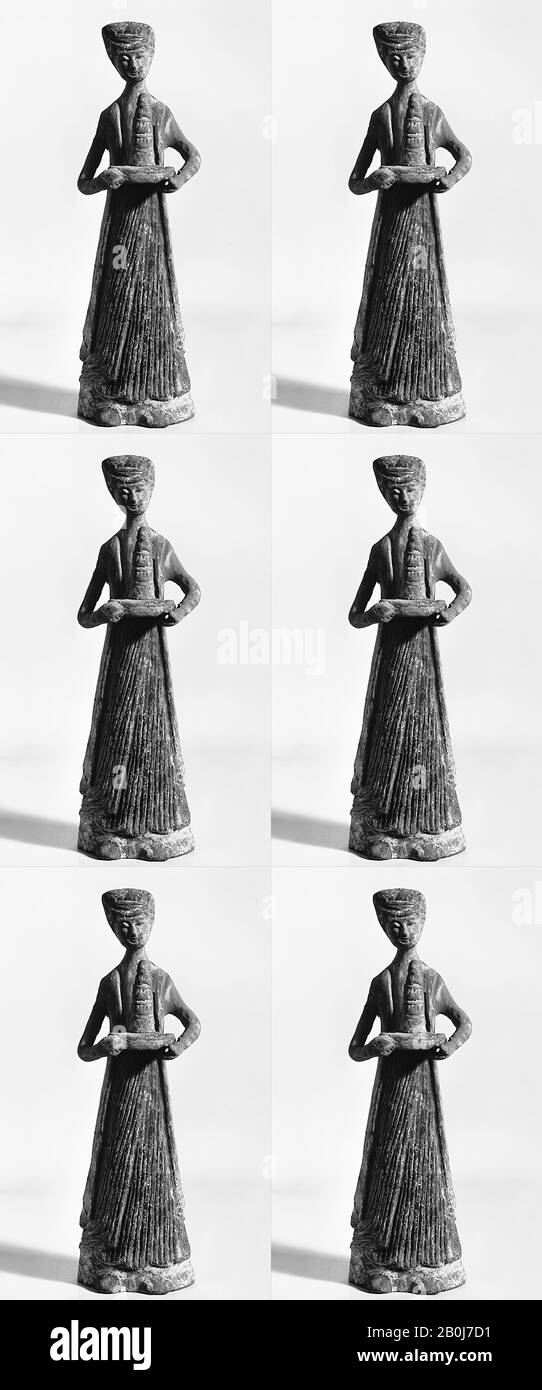 Figure, Chine, dynastie des Wei du Nord (386–534), Culture : Chine, faïence Rougeâtre avec des traces de couleur, H. 9 in. (22,9 cm), poterie tombeuse Banque D'Images