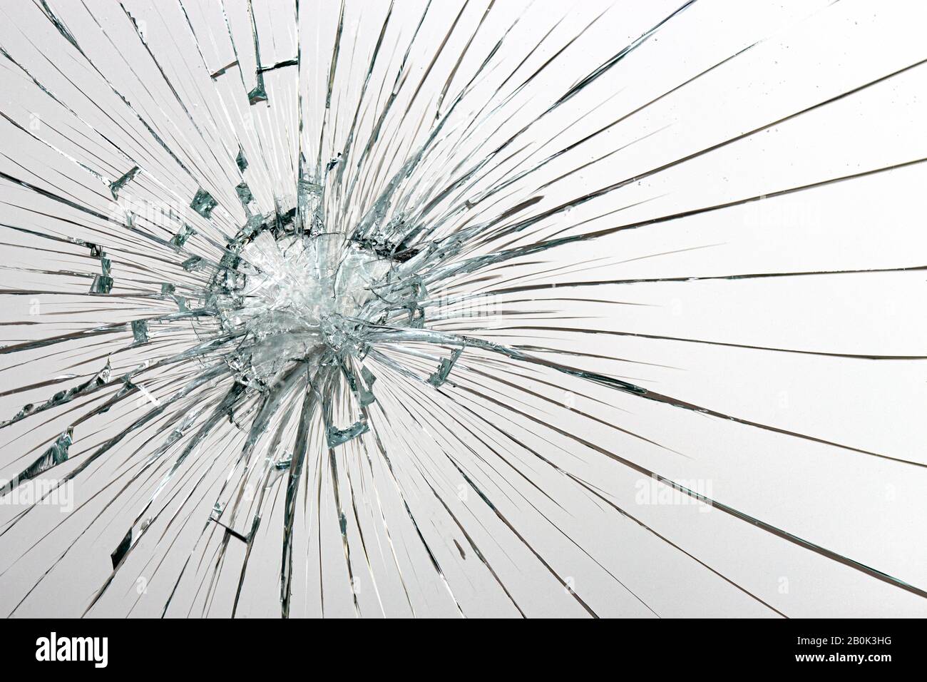 Trous de billes en verre sur fond blanc Banque D'Images